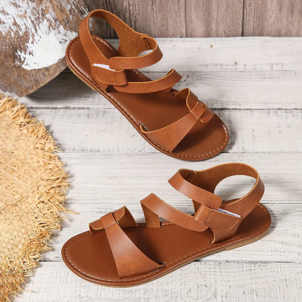Women's flat sandals with Velcro strap in black, brown and colourful pattern options