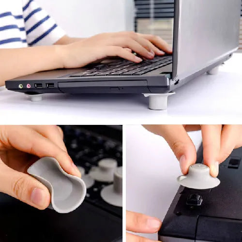 Four grey durable plastic laptop cooling pads in two sizes on a flat surface