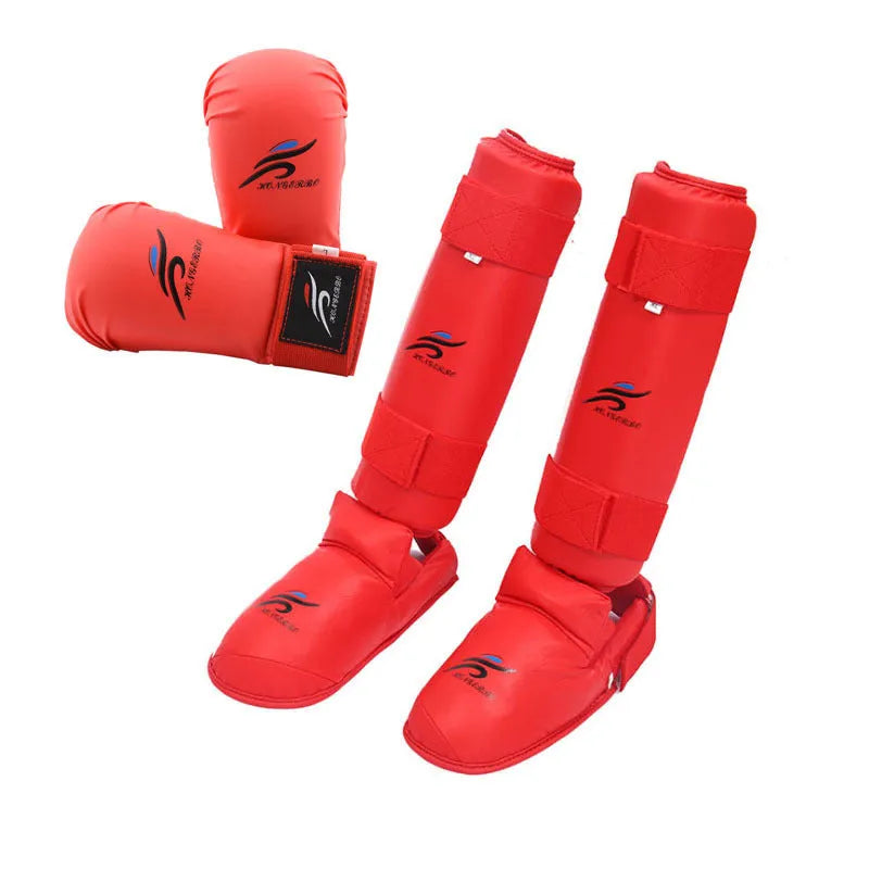 Karate and taekwondo protective gear set with red leg guards, helmet, and boxing gloves