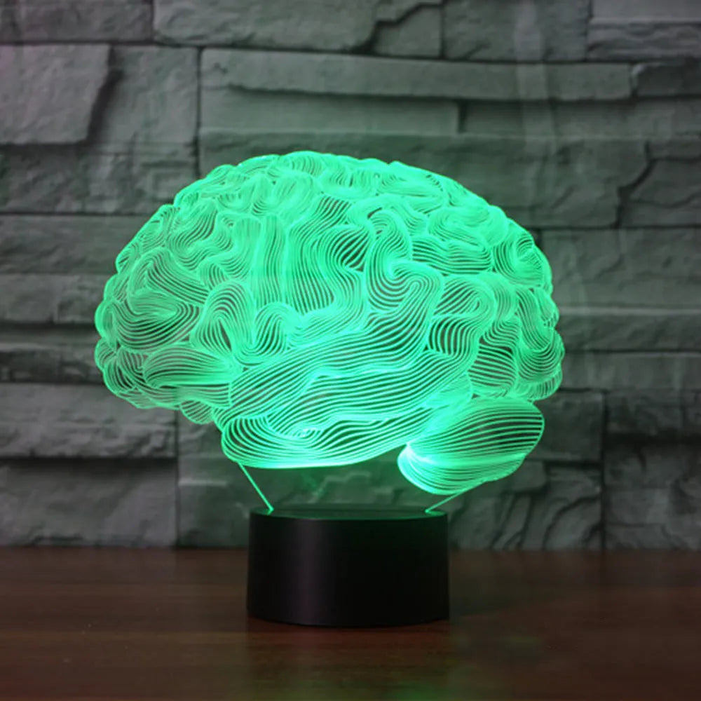 3D brain illusion LED lamp with acrylic plate glowing in multiple colours on a desk