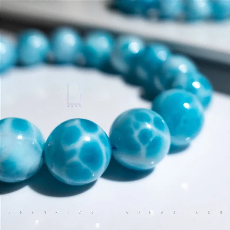 Handmade blue sea-pattern natural crystal Bodhi bracelet with pearl accents on wrist