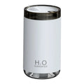 White USB jellyfish humidifier with warm night light on a table