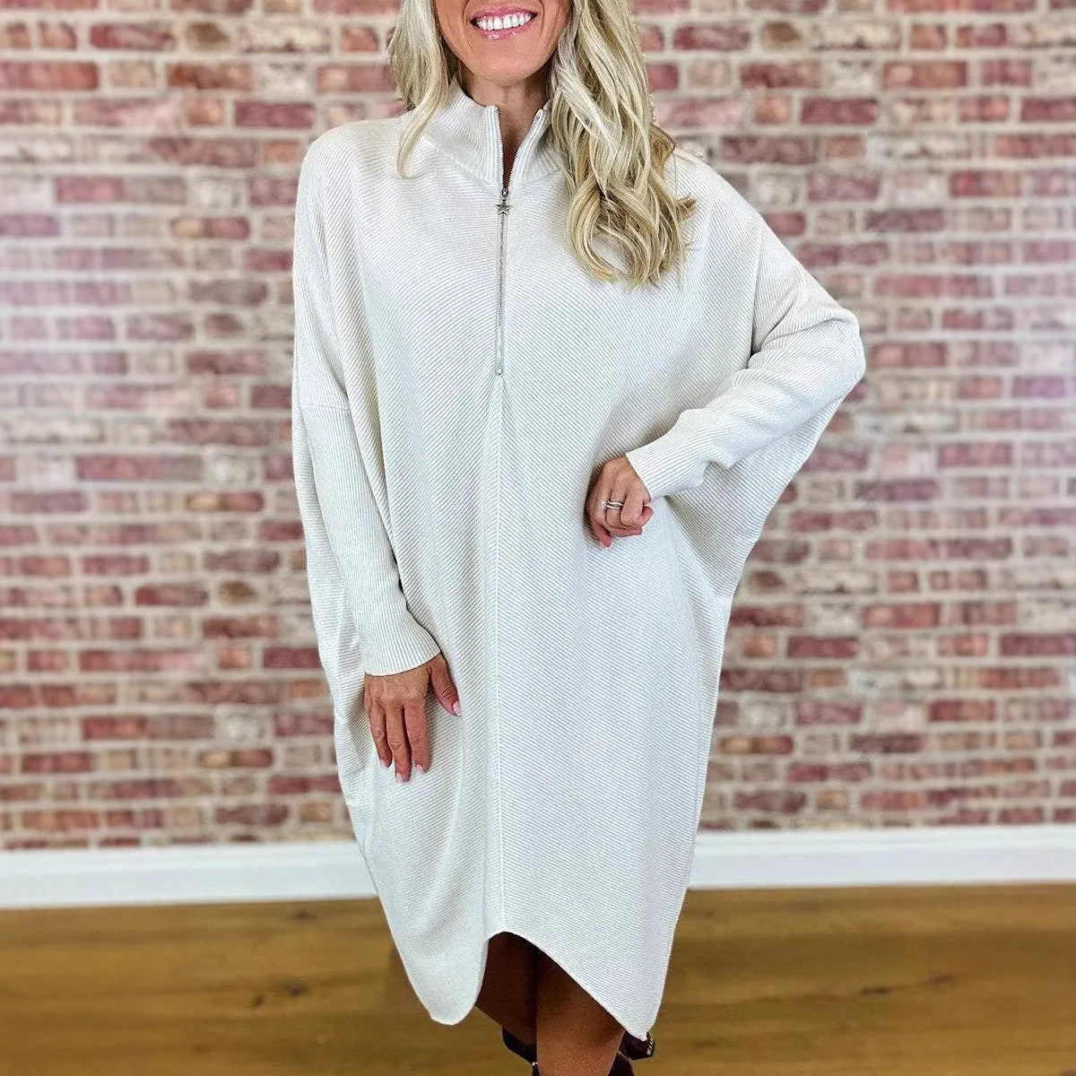 Women's solid colour knitted loose dress with raglan sleeves in dark green colour