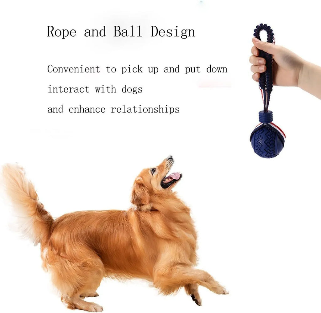 Red rubber dog ball with rope attachment for tug of war and teeth cleaning