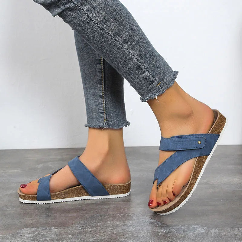 Women's blue thick-soled flip-flops with flat toe ring design on artificial PU upper