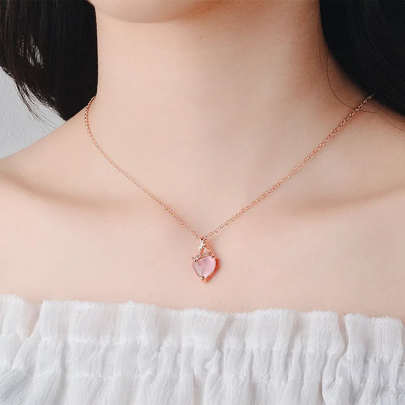Women's heart-shaped pink artificial crystal pendant necklace with rose gold cross chain