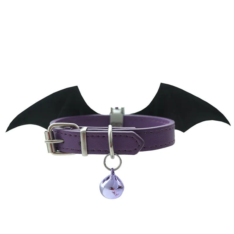 Black patent leather choker collar with devil wings design and bell attachment