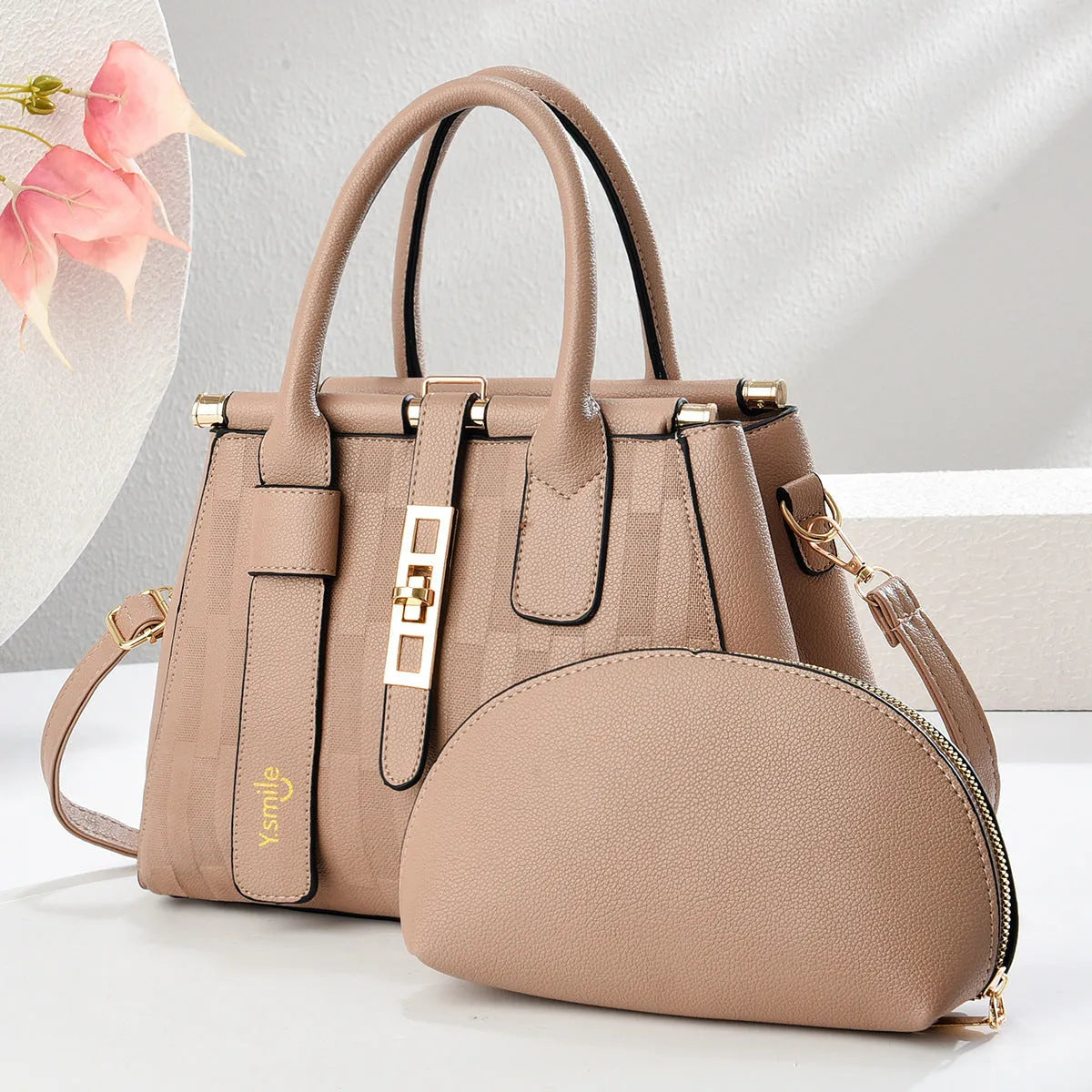 Round PU leather crossbody shoulder bag in black, shown with adjustable strap and measuring 28cm wide.