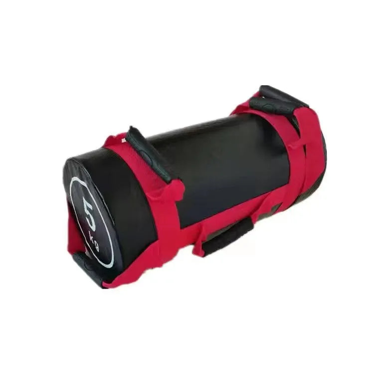 White PVC fitness training sandbag on gym floor, available in weights from 5KG to 30KG.
