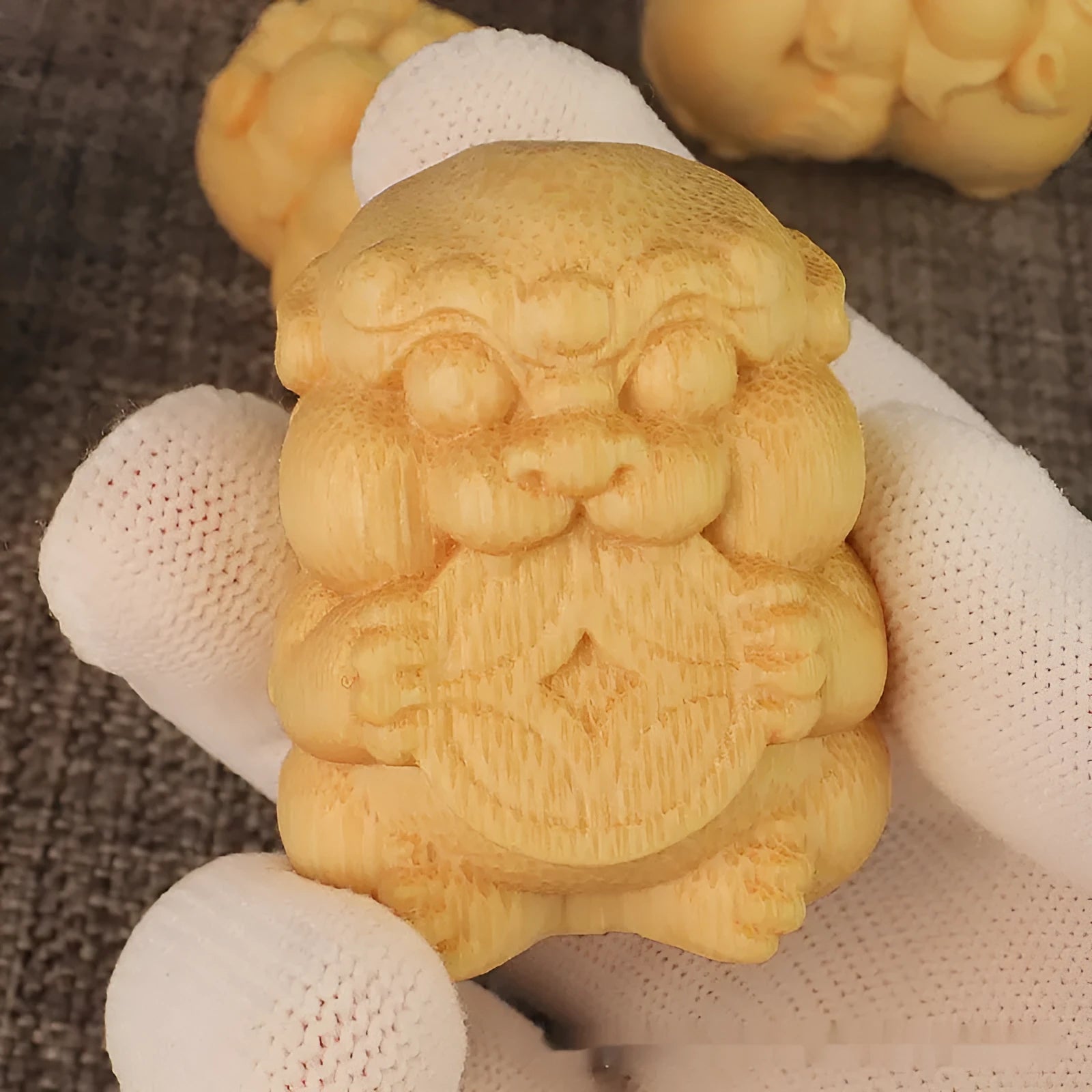 Solid bamboo take money charm ornament measuring 4.5cm tall on a display surface.