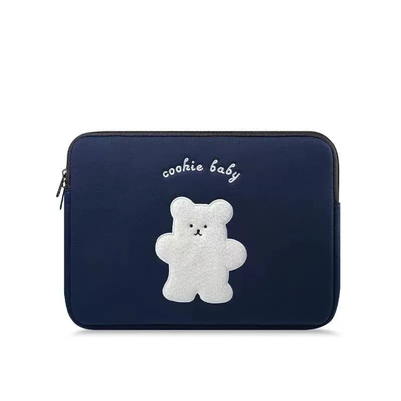 Embroidered laptop sleeve with animal design showing polyester construction and laptop size compatibility