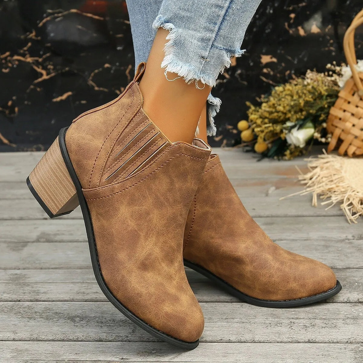 Women's black ankle boots with pointed toes and thick square low heels, slip-on design