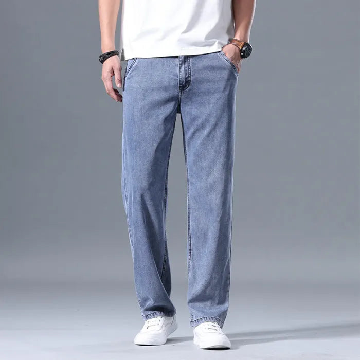 Men's loose straight-leg lyocell jeans in light blue colour with zipper fly