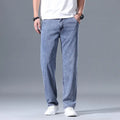 Men's loose straight-leg lyocell jeans in light blue colour with zipper fly