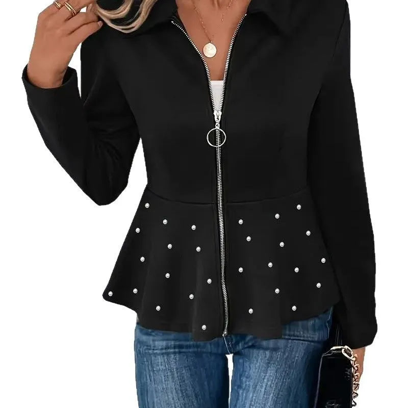 Women's black loose-fit coat with beaded heavy-duty zip and ruffle hem detail.