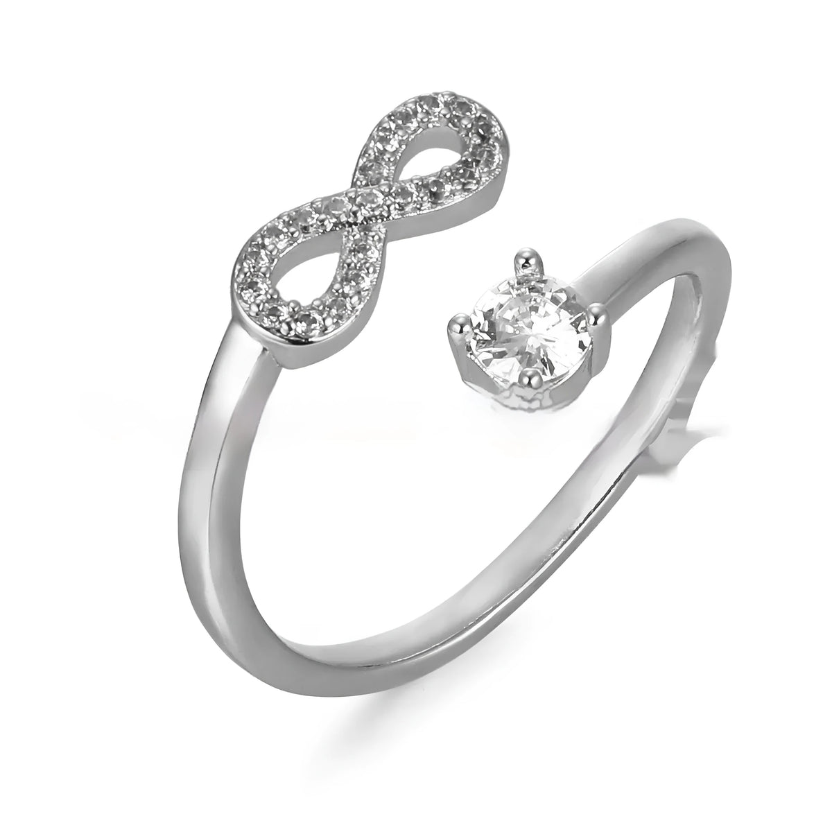 Geometric open ring with a single inlaid zircon letter on a metal band, shown in gold, rose gold, and silver finishes.