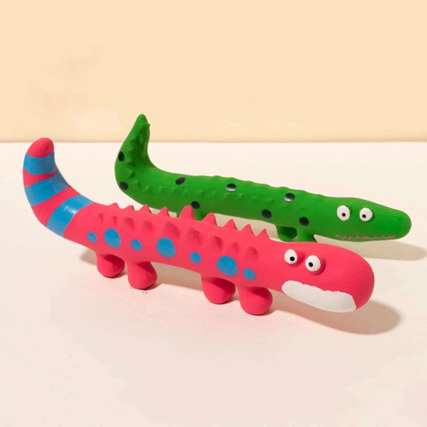 Green cartoon lizard shaped dog chew toy with squeaker measuring 24x10x3cm