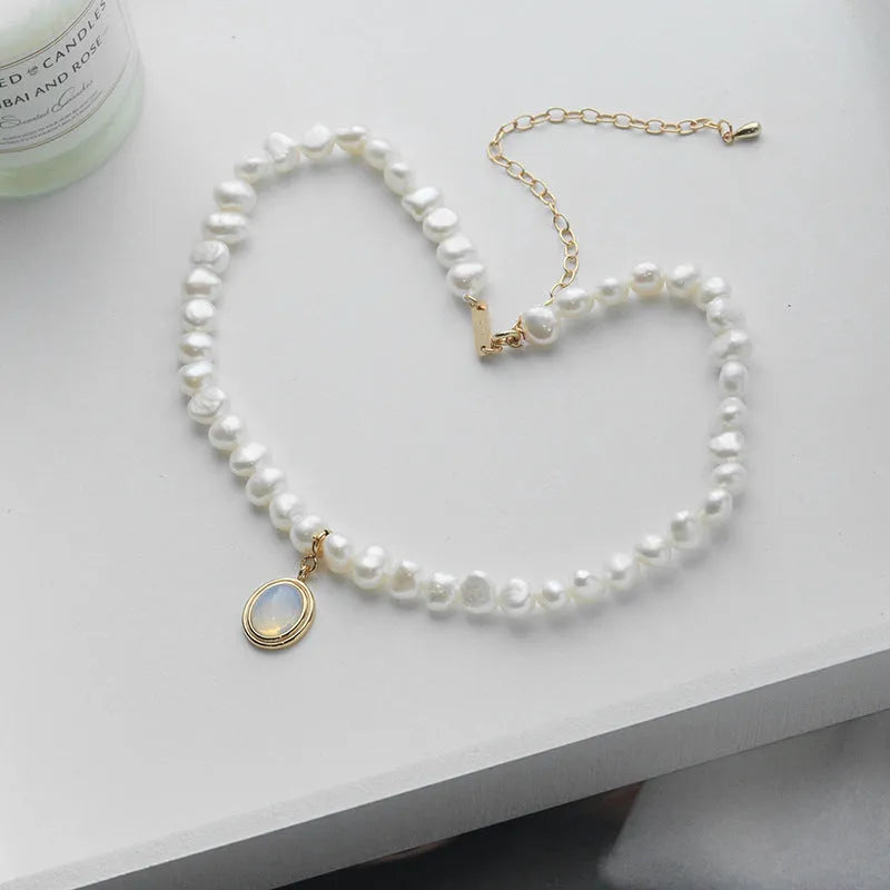 Geometric round medal pearl necklace with irregular freshwater pearls on adjustable silver chain