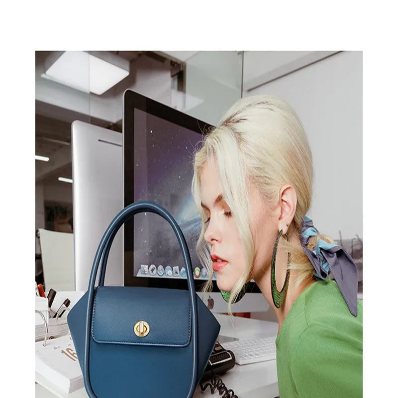 Cow leather wing shape tote bag with cross-body strap in one of four colour options
