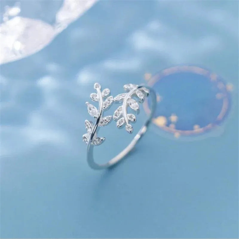 Women's copper electroplated leaf branch fashion ring in gold or silver geometric design