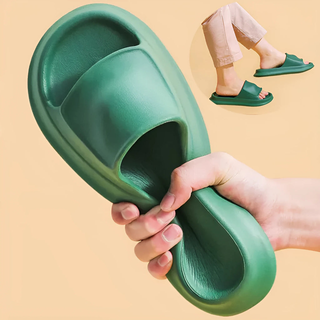 Unisex thickened EVA flip-flop slippers in black with a non-slip sole for bathroom use.