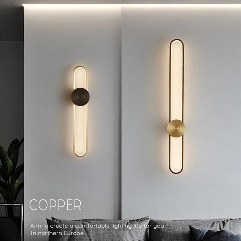 Round 60cm modern wall lamp with iron shade in black or gold frame finish.