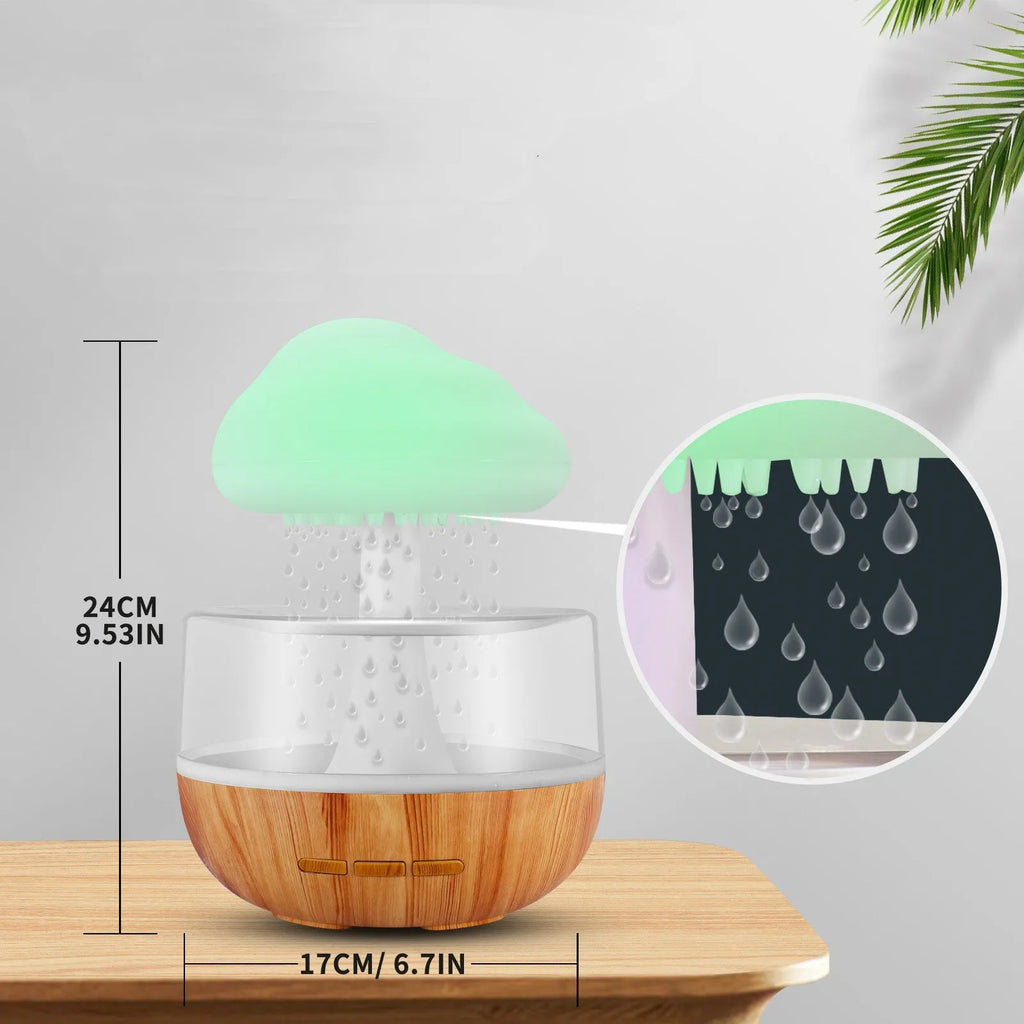 White raining cloud-shaped humidifier with night light and water drop essential oil diffuser.