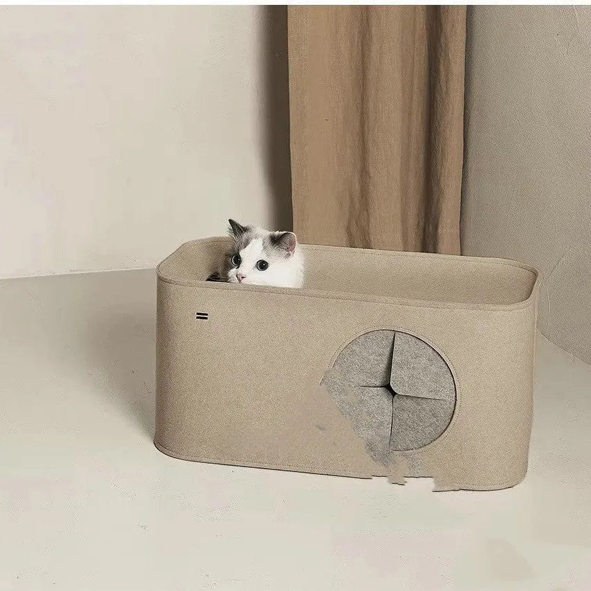 Grey foldable felt cat nest shown both set up and folded flat, placed next to a cat cage.