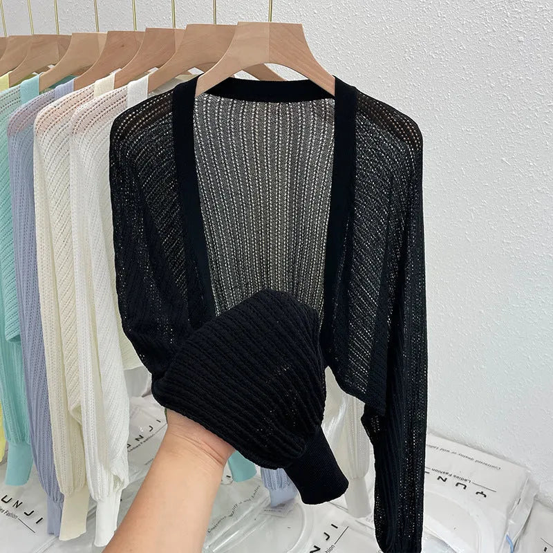 Hollow-out long sleeve blouse with lantern sleeves in apricot colour