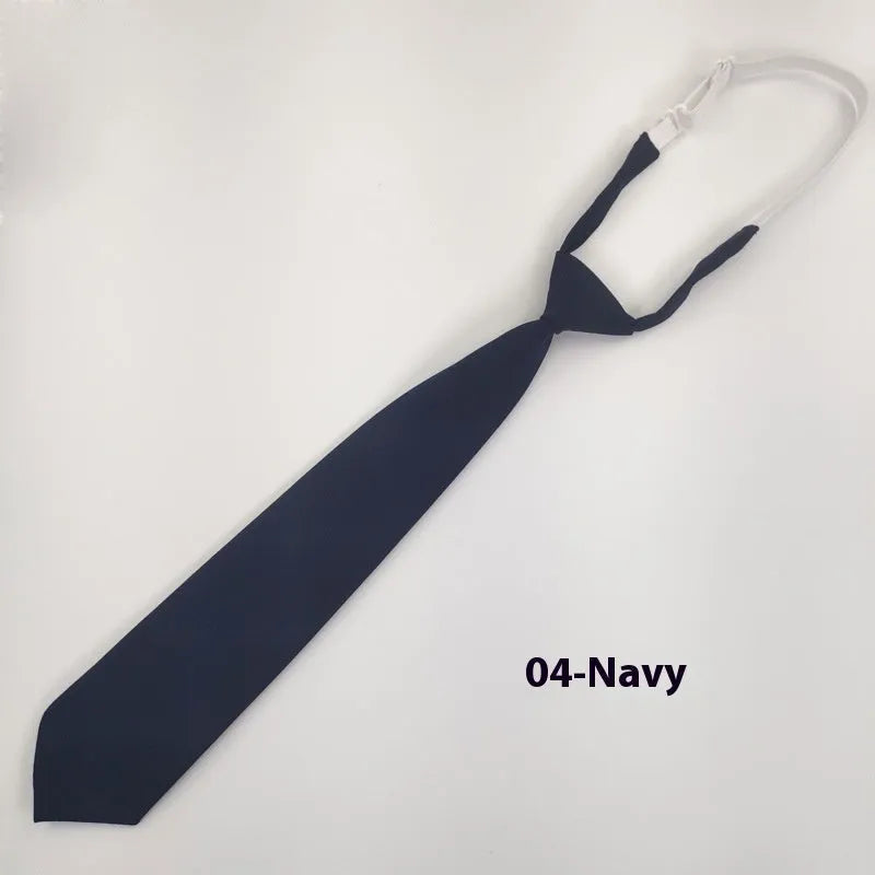 Navy blue cotton bow tie with arrow style shape measuring 35cm by 7cm