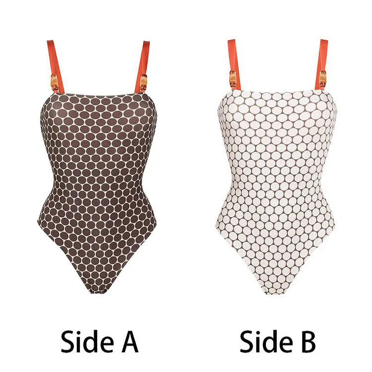 Women's dotted one-piece swimsuit with a matching wrap skirt laid flat.