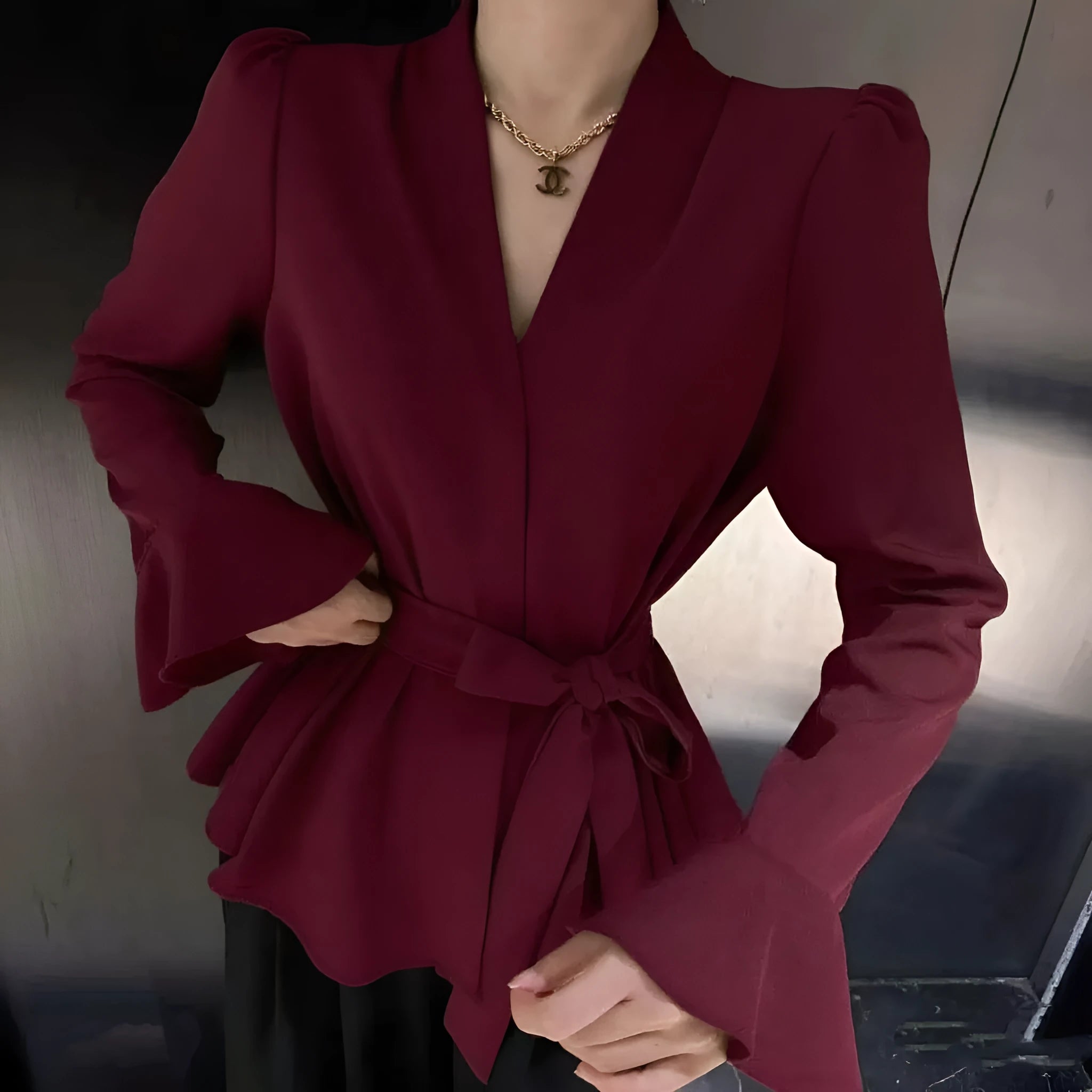 Women's French-style irregular collar long sleeve tied shirt with bell sleeves in polyester fabric