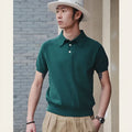 Retro slim fit cotton short-sleeved T-shirt on a hanger, shown in dark brown colour.