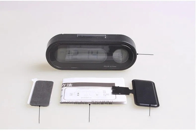 Black digital car clock and thermometer with LED display on adjustable stand