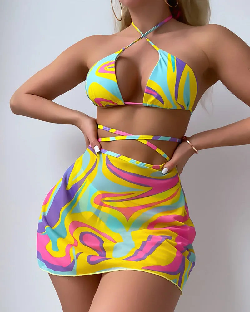 Yellow striped print halter neck swimsuit with lace-up front, includes skirt and shorts