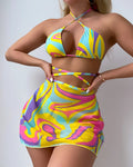 Yellow striped print halter neck swimsuit with lace-up front, includes skirt and shorts