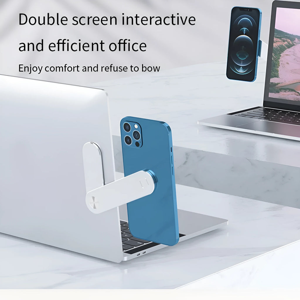 Black aluminium laptop phone holder with magnetic mount attached to laptop edge