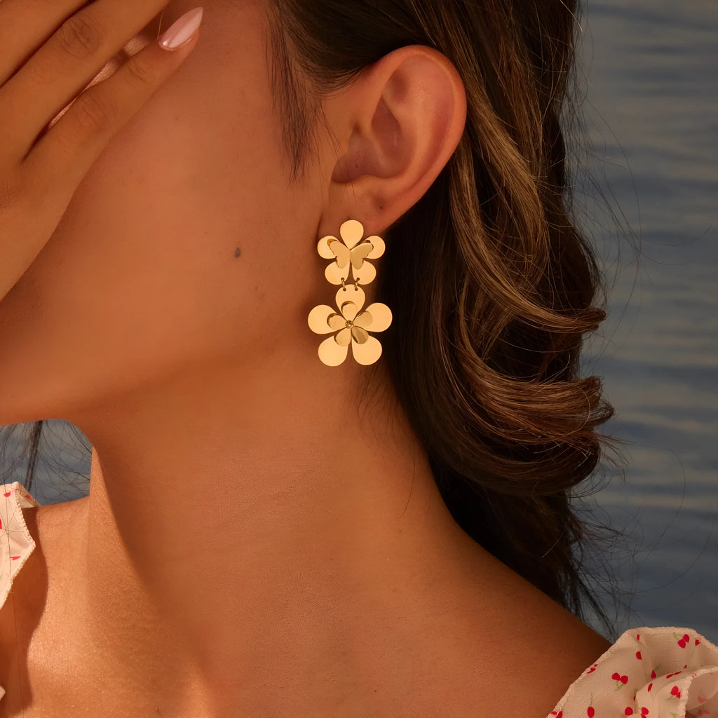Gold floral butterfly design stainless steel earrings for women with geometric elements