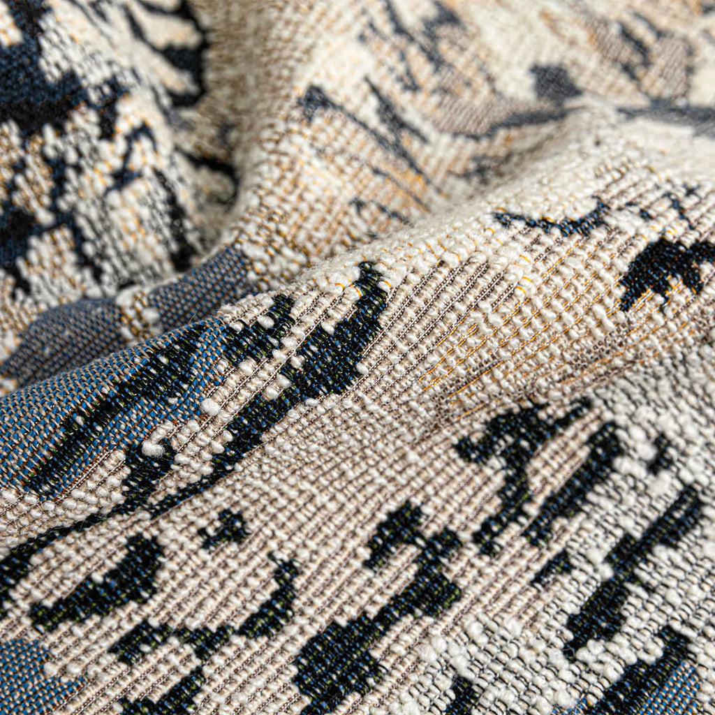Blue wool blended decorative cushion with abstract flower pattern, shown in square and waist sizes.