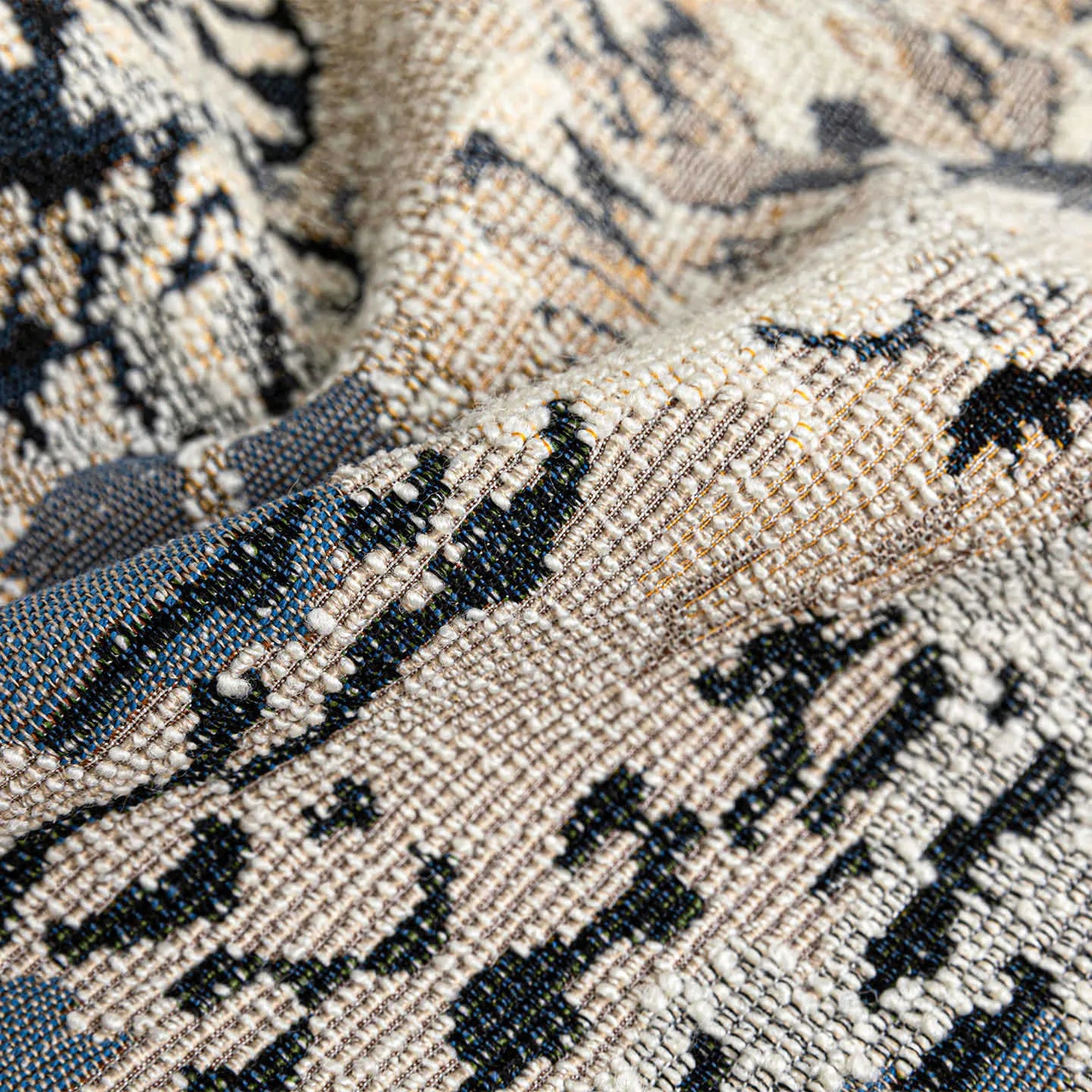 Blue wool blended decorative cushion with abstract flower pattern, shown in square and waist sizes.