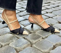 Apricot black colour block women's stiletto sandals with pointed toe and buckle strap.