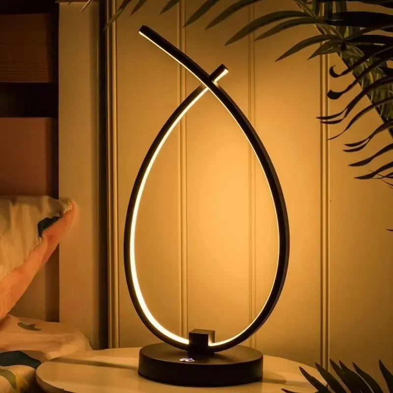 Black and white USB touch control table lamp with water drop shape measuring 30cm tall