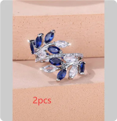 Adjustable copper leaf ring with zircon accents in multiple colour finishes including platinum white and rose gold