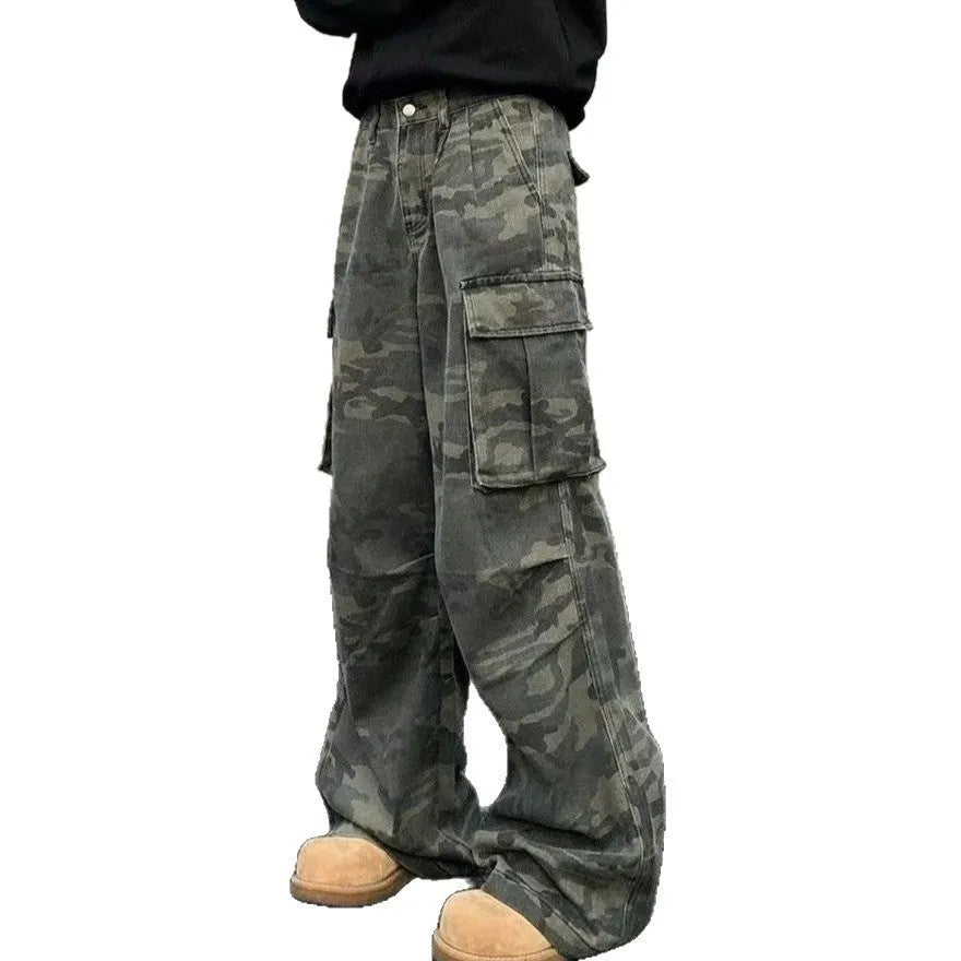 American vintage washed camouflage green cargo trousers with multiple pockets on a neutral background.