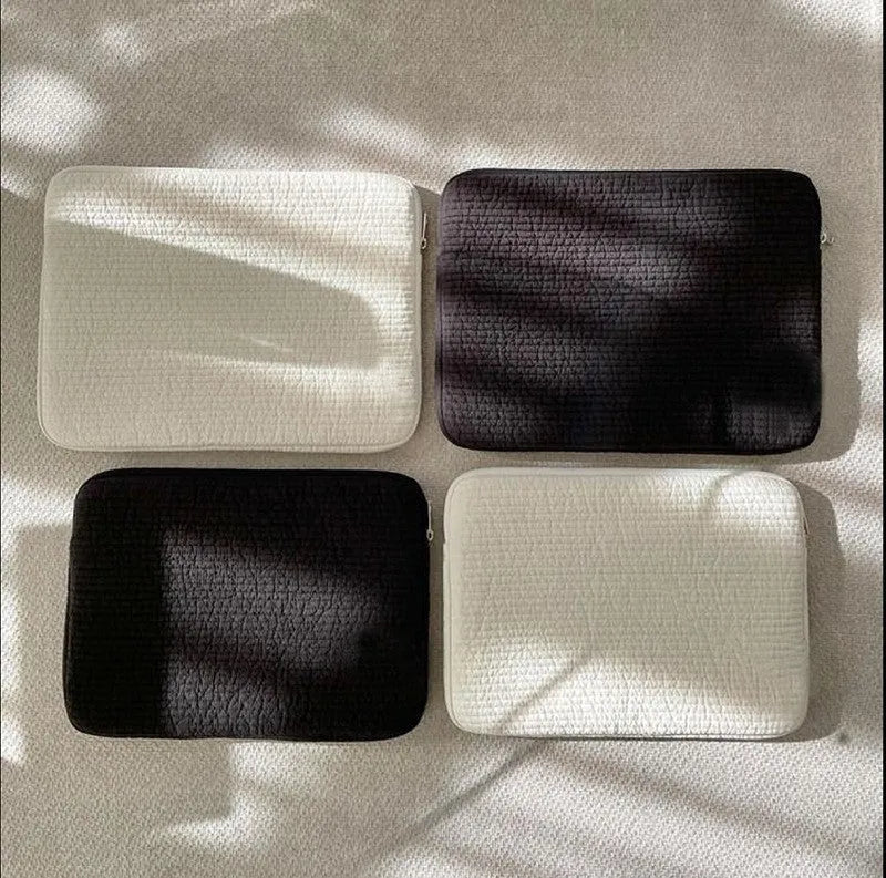 Hand-held black and white anti-seismic laptop bag for tablets in multiple sizes