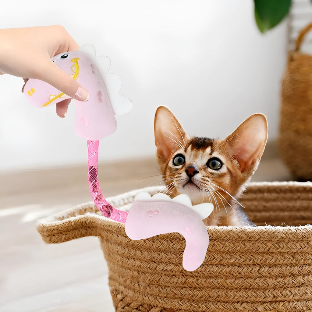 Four-piece cat toy bundle showing chew toy, plush mouse, fish, and bunny in pink, purple, and yellow colours.
