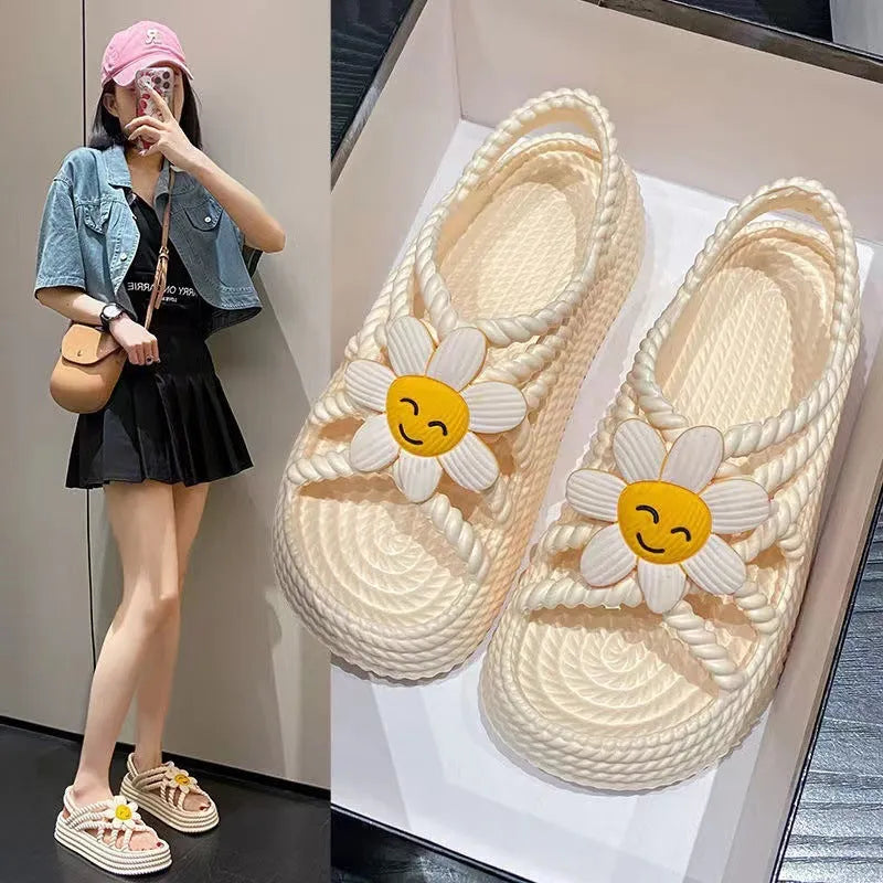 Beige PVC women's sandals with a sunflower decoration and round toe