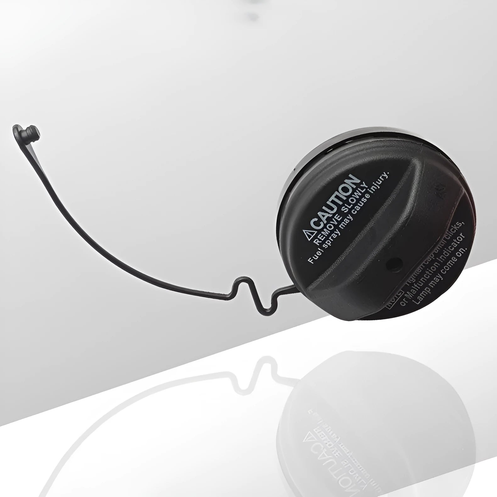 Snap-type fuel tank cap replacement part for Toyota vehicles.