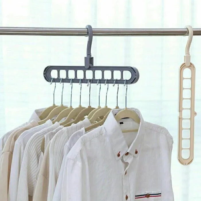 Plastic clothes hanger with a rotating hook in assorted colours on a white background.