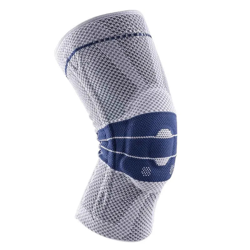 Black and blue adult sports knee pad made from nylon and spandex, shown on a knee.
